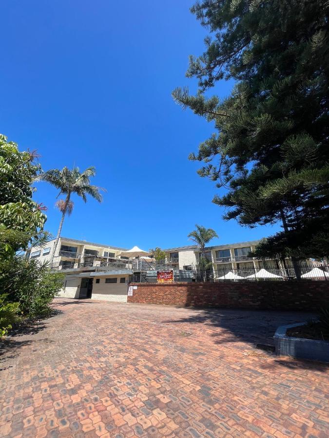 El Lago Waters Hotel Entrance Exterior photo